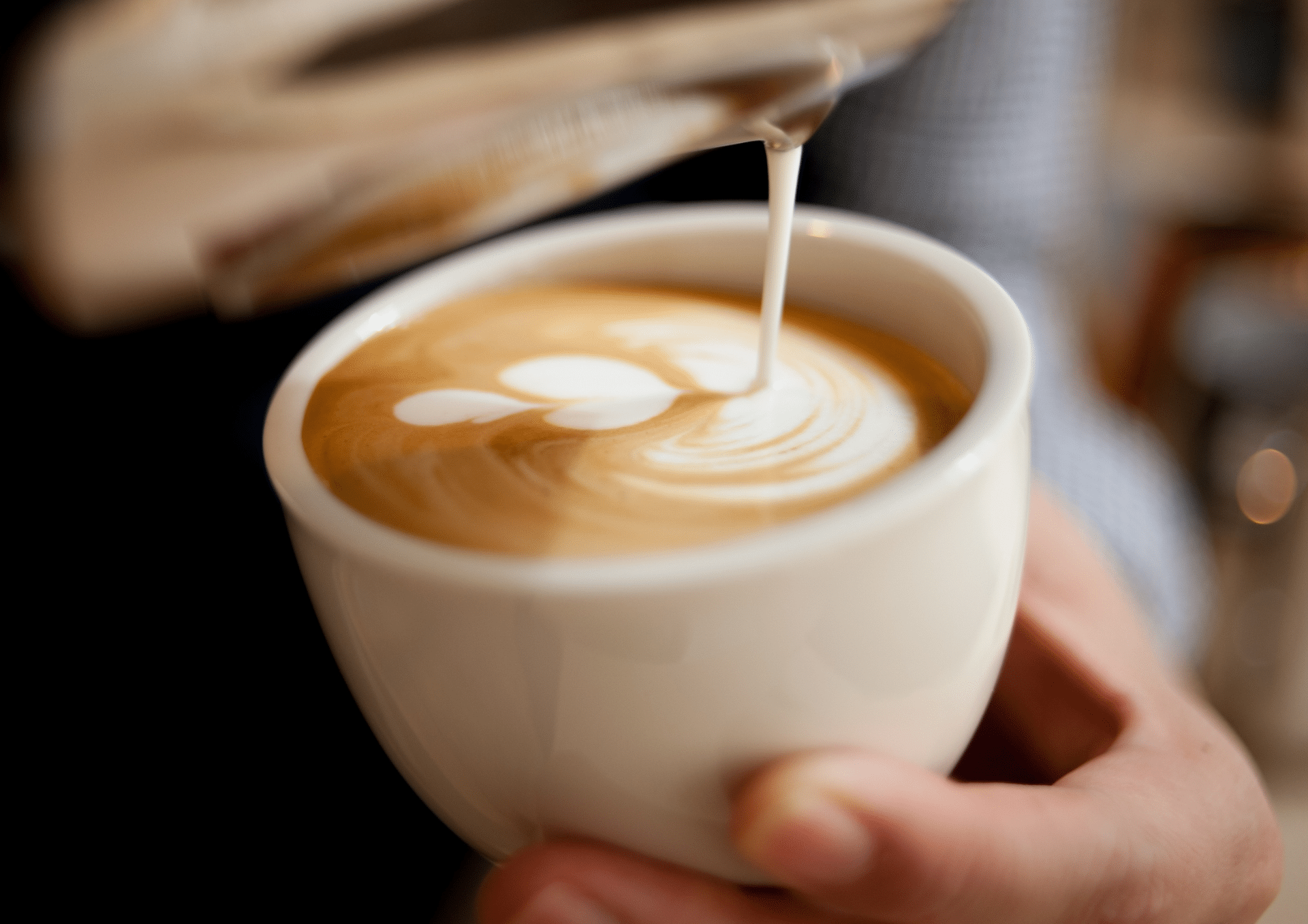 Cup of coffee being poured