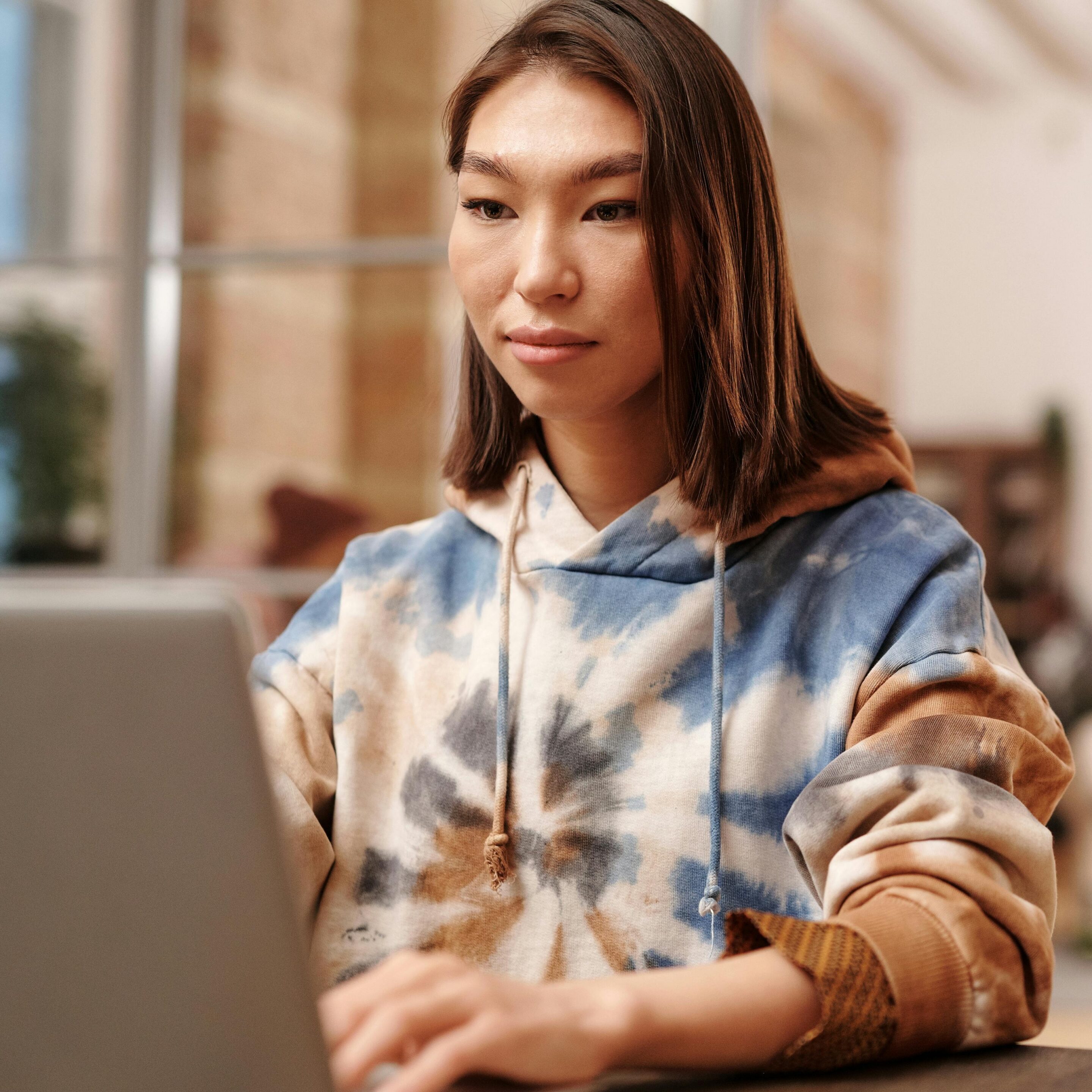 Sam resting against a wall