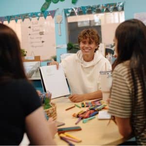 Young people learning together at Youth Off The Streets alternative highschool