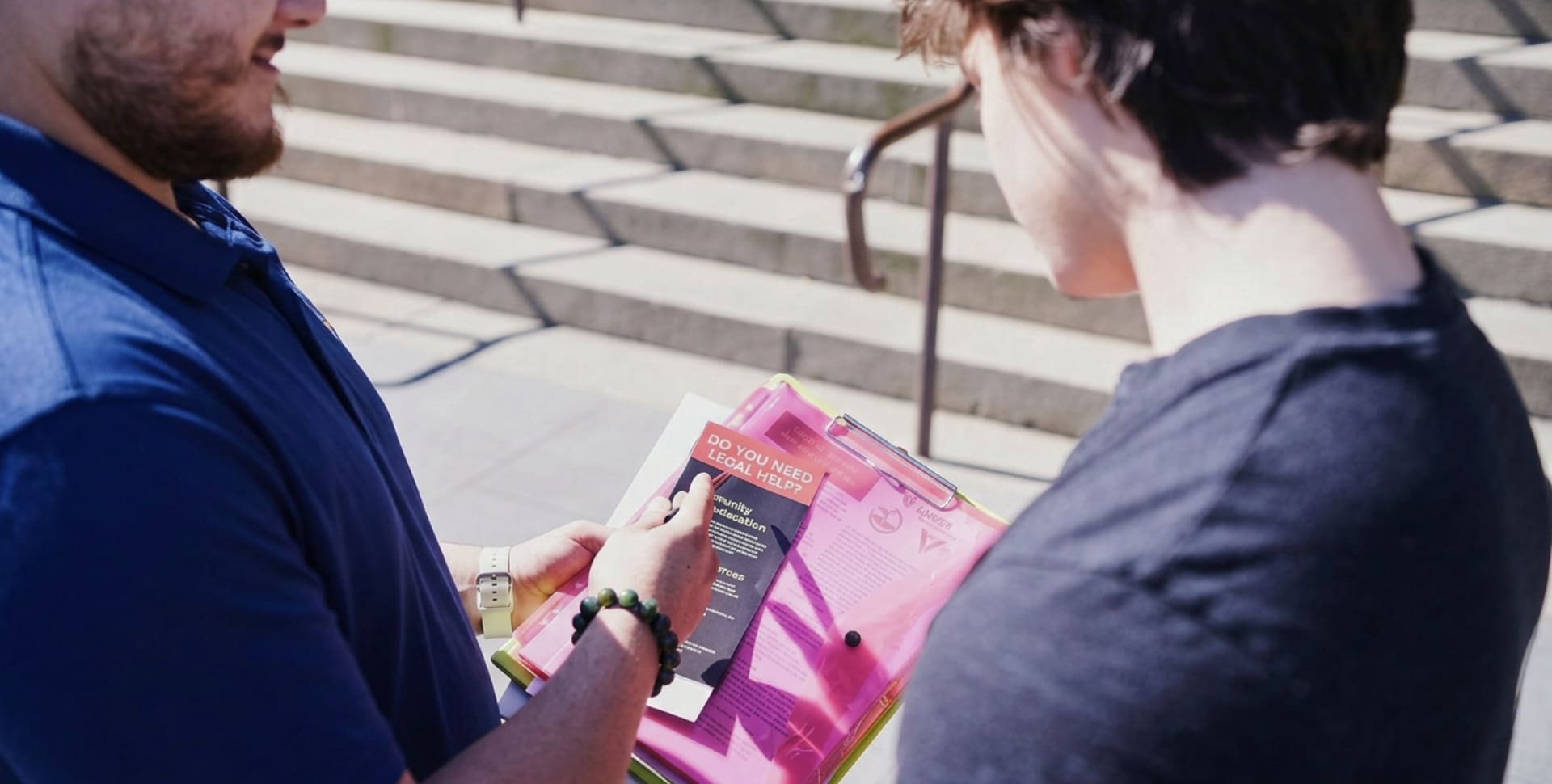 A youth Off The Streets youth support worker offering justice support to a young person from a refugee background