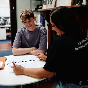 Teen girls in woodworking class